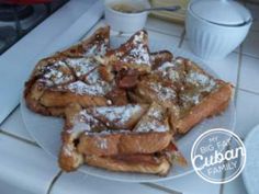 french toast on a plate with powdered sugar