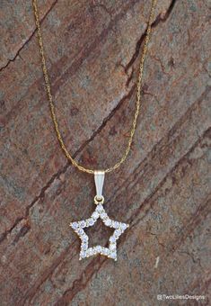 You are my shiny star necklace. Elegant sparkly star pendant set with tiny zircon stones hanged on a 14K Gold Filled chain necklace. Beautiful shimmering  classic star jewelry gift for her. Necklace fits with any outfit and looks great for any occasion day or night. This celestial jewelry is simple yet timeless. Perfect gift for a birthday, anniversary, mom, sweet 16, bridal or spoil a loved one.♥ DETAILSChain: 14K Gold FilledPendant: 13mm x 13mm (0.52" x 0.52") - Star 2 micron thick gold cover Gold Star-shaped Jewelry With Sparkling Stones, Gold Star Jewelry With Sparkling Stones, Gold Star-shaped Cubic Zirconia Necklace, Gold Cubic Zirconia Necklace With Star Charm, Yellow Gold Star-shaped Cubic Zirconia Necklace, Yellow Gold Star Necklace With Cubic Zirconia, Dainty Star-shaped Cubic Zirconia Necklace, Dainty Cubic Zirconia Star Necklace, Gold Star Necklace