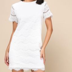 This Beautiful Lulus Shift Dress In Size S Is Perfect For Any Occasion. The Dress Features A Stunning Floral Pattern On A Ivory-Colored Base, With A Lace Fabric Type That Adds A Touch Of Elegance To The Design. The Short-Sleeved Dress Has A Round Neckline And A Zip Closure For Easy Wear, Making It Suitable For Travel, Weddings, Parties, Casual Outings, And Formal Events.Made From A Blend Of Polyester And Cotton Materials, This Dress Is Comfortable To Wear And Easy To Care For. Its Dress Length I White Mini Dress With Scalloped Edges, White Lace Dress With Scalloped Edges For Summer, White Scalloped Edge Dress For Brunch, White Dresses With Scalloped Edges For Brunch, Fitted White Lace Dress With Scalloped Edges, White Fitted Lace Dress With Scalloped Edges, Elegant White Lace Dress With Scalloped Edges, Spring Mini Dress With Scalloped Edges And Short Sleeves, Short Sleeve Mini Dress With Scalloped Edges For Spring