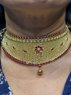 22 karat gold choker necklace with color stones - 235-GN4929 - in 30.350 Grams for USD $3,151.35 USD. 
Made in India by Totaram Jewelers Online this product is in Gold - 22 Karat BIS Hallmark 916 Gold  & is an excellent gift for Adult - Women. Ships fully insured with secured guaranteed delivery for free with your order over $250 from New Jersey USA & comes with 30 days exchange policy. Gold Meenakari Bridal Choker Necklace, Gold Ruby Jewelry Sets With Tilla Detailing, Gold Choker Jewelry Sets For Ceremonial Occasions, Gold Meenakari Choker Jewelry, Gold Ruby Necklace With Intricate Design, Elegant 22k Gold Choker For Wedding, Elegant 22k Gold Wedding Choker, Gold Hand-set Temple Jewelry Choker, Gold Choker With Hand Set Details For Festivals