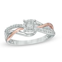 a white and rose gold ring with diamonds