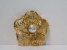 Vintage Gold tone Reticulated Petals Flower Brooch with Faux Baroque Pearl Brooch. Flower Pin. Elegant Gold Brooches For Spring, Formal Flower Brooch For Spring, Formal Spring Flower Brooch, Formal Spring Flower Brooches, Spring Gold Brooch Jewelry, Spring Gold Jewelry Brooch, Gold Brooch Jewelry For Spring, Spring Season Gold Brooch Jewelry, Gold Brooches For Spring Gift