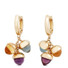 Experience Italian artistry at its finest with our Toscano gemstone dangle earrings in 14k yellow gold. Citrine, amethyst and aquamarine gemstones are shaped into acorns with yellow gold caps that dangle from gorgeous hoops. The captivating colors and creative design make for a truly unique pair of earrings sure to add a playful pop to all of life’s moments, big and small. Yellow Gold Gemstone Dangle Earrings, Gold-plated Yellow Gold Earrings With Gemstone Accents, Yellow Gold Multi-stone Drop Earrings, Gold Caps, Aquamarine Gemstone, Yellow Gold Earring, Gold Collection, Blue Gemstones, Earring Backs