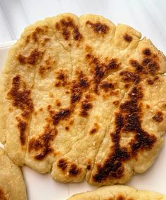 some pita bread on a white plate