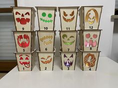 several boxes with different designs on them sitting on a table