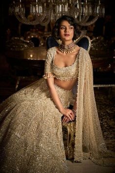 This Indian Bridal Champagne Pearl Blouse Lehenga set highlights perplexing weaving in pearl, sequin and silver string. The shirt has pearl and precious stone subtleties at the neck area and shows tufts at the elbow. It is matched with a weighty all-over-weaved dupatta. The boundary is scalloped and shows pearl and precious stone drops.
For more details contact us on our WhatsApp 
+1 (732) 351-5426
Visit our website 
www.nameerabridal.com
#bridaldressonline #bridaloutfit #usabridalgown #usabrida