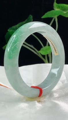 🪷💐We promise with our shop credit that all jadeite products are natural Myanmar unheated Jadeite⚘️every high class jadeite bangle,earrings,pendant will come with international appraisal certificate for free.🌴⚘️  🌻We promise that no fake stone could be found in my shop!🌹And my gold is quality solid 18k gold.🌻 🌿Size : 55.5*12.4*9mm  🍁It comes with certificate 5687🌹         🪺🪺 Beautiful green natural jadeite jade women bangle .🍁It is ⚘️⚘️A- grade  A beautiful bracelet, old type Yang green, 🪷🍀 delicate foundation   Perfect.This looks very generous and vairies colorful and more beautiful  without any cracks  and damage .It can easily match your outfits. ☘️🌼🌻  When you put it on , it will  light you up the whole day . It is a versatile adornment suitable for men , women and child Luxury Green Jade Bangle, Luxury White Jade Bangle, Green Jade Bracelet For Wedding, Bangle Earrings, Floating Flower, Self Thought, Fake Stone, Green Bracelet, Floating Flowers