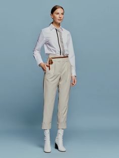 Moad Pant Cream – Silvia Tcherassi US Cuffed Ankle Workwear Pants For Fall, Office High-waisted Pants With Button Cuffs, High Waist Pants With Belted Cuffs For Work, Fall Workwear Pants With Cuffed Ankles, Workwear Trousers With Button Cuffs, Fitted Office Pants With Belted Cuffs, Workwear Tapered Leg Pants With Button Cuffs, Ankle-length Workwear Pants With Zipper Closure, Fitted Pants With Belted Cuffs For Office