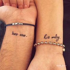 two people with matching tattoos on their wrists that say her one and her only