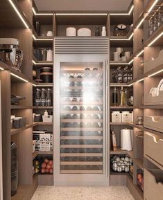 a very large walk in pantry with lots of shelves