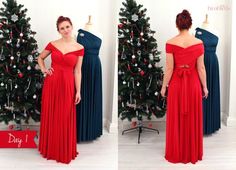 a woman wearing a red dress standing in front of a christmas tree with her hands on her hips