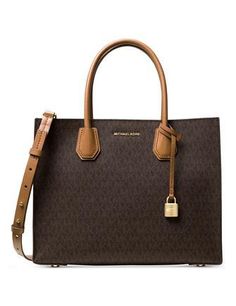 Classic monograms distinguish a MICHAEL Michael Kors convertible tote furnished with double handles and a sleek shoulder strap for chic work-to-weekend carry.12-1/2"W x 9-3/4"H x 5-1/2"D; (width is measured across bottom of tote)5-1/2"L double handles; 15-3/4" to 18-14"L adjustable strapOpen topGold-tone exterior hardware1 interior center zip compartment with 1 zip pocket insideMK Signature Double Sided Coated Twill faux leather; lining: polyesterColor: Brown Sac Michael Kors, Michael Kors Mercer, Bags Michael Kors, Womens Designer Handbags, Brown Tote, Brown Purses, Tote Handbag, Purses Michael Kors, Handbags Michael Kors