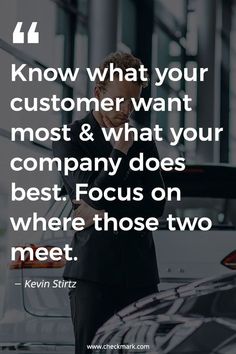 a man standing in front of a car talking on a cell phone with the quote know what your customer want most & what your company does best