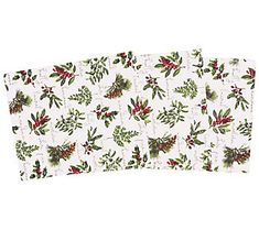 three placemats with holly and berries on white paper, one is folded in half