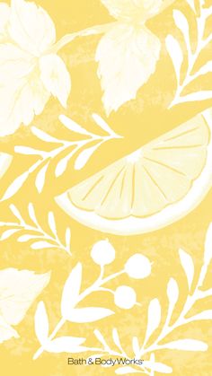 a yellow and white wallpaper with lemons, leaves and flowers on the side