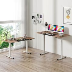 two computer desks sitting next to each other on top of a hard wood floor