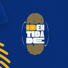 a blue t - shirt with yellow fingerprints on it