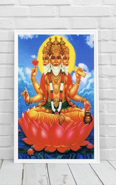 an image of hindu god sitting on top of a lotus