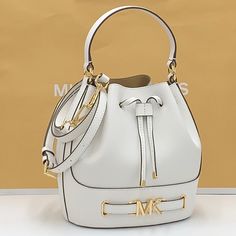 Michael Kors Reed Medium Pebbled Leather Bucket Bag Satchel Crossbody Handbag Optic White Nwt New With The Tag Authentic The Reed Infuses Glamor Into An Otherwise Austere Bucket Bag Design. Crafted From Smooth Leather, It Features A Drawstring Closure That Opens To A Spacious Interior. A Belted Feature With Our Gold-Tone “Mk” Hardware And Coordinating Accents Finish It With A Gilded Touch. Carry It By The Top Handle Or Wear It Crossbody With The Removable Strap. Bucket Bag Pebbled Leather 100% L White Bucket Bags With Removable Pouch, White Bucket Satchel For Shopping, White Bucket Satchel, Michael Kors White Shoulder Bag With Branded Hardware, White Michael Kors Shoulder Bag With Branded Hardware, White Bucket Bag With Gold-tone Hardware For Travel, White Rectangular Bucket Bag With Gold-tone Hardware, White Bags With Gold-tone Hardware For Travel, White Crossbody Bucket Bag With Removable Pouch