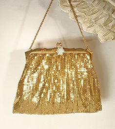 I was beyond thrilled when I found this purse Offering an absolutely stunning very high quality vintage 1940s era liquid gold mesh and crystal rhinestone, and simulated pearl Art Deco flapper evening bag/wristlet clutch purse in near PRISTINE vintage condition made by legendary designers Whiting & Davis.  This purse will be as perfect with a pair of jeans and a tee as it will with a Bridal gown. If you've ever seen one of these purses in person you know that photos are not doing it justice as th Vintage Handheld Evening Bag For Party, Vintage Rectangular Evening Bag For Party, Vintage Clutch Evening Bag For Events, Victorian Rectangular Evening Bag For Party, Victorian Rectangular Party Bag, Vintage Handheld Evening Bag, Vintage Evening Bag For Vintage Events, Vintage Handheld Evening Bag For Weddings, Vintage Handheld Evening Bag For Wedding