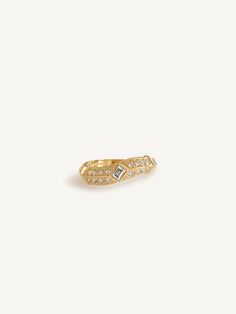 Whether you're celebrating a modern milestone or honoring a commitment to a partner, this Franco Curved Ring is anything but ordinary. 14k solid gold - always Weighs about 3.9 grams 5.5mm thick (front), 2.5mm (back) Diamond Clarity: SI1-2 The ring features a 0.14cw baguette diamond and 0.36cw round diamonds. We offer custom sizes upon request. Please add the Custom Size request to your cart from HERE. Custom sizes are final sale. Half sizes are final sale. *One-Of-A-Kind: All stones used at Kinn Heirloom Diamond Ring With Baguette Diamonds, Heirloom Gold Diamond Ring With Baguette Diamonds, Heirloom Baguette Diamond Ring For Formal Occasions, Heirloom Diamond Ring With Baguette Diamonds For Formal Occasions, Heirloom Style Baguette Diamond Ring For Formal Occasions, Formal Baguette Diamond Open Ring, Curved Ring, Curve Ring, Broken Chain