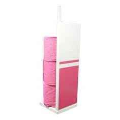 a pink and white toilet paper dispenser with four rolls on it's side