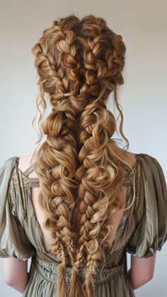 Celebrate in style with these festive two braids and curls. Perfect for parties. Save this pin for festive braid and curl ideas! #TwoBraidsWithCurls #FestiveStyle #PartyLook Twisted Braids Hairstyles, Midevil Hairstyles, Two Braids With Curls, Viking Inspired Hair, Creative Braided Hairstyles, Long Braids Hairstyles, Fantasy Braids, Elvish Hairstyles, Maiden Braid