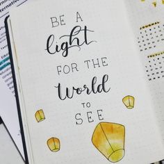 a notebook with the words be a light for the world to see