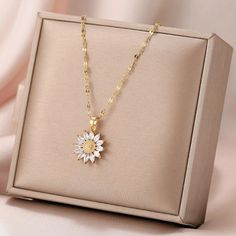 Brand New Gold Tone Sunflower Necklace With Cz Crystal Petals With Tiny Diamante Dots In The Heart. Beautiful Chain 10% Off Two Items Or More. Women,Ladies,Daywear,Nightwear,Flowers,Petals,Chain,Necklaces,Crystal,Cz,Diamante,Gold, Big Pendant Necklace, Necklaces Beautiful, قلادات متدلية, Sunflower Pendant, Sunflower Necklace, Viking Necklace, Celtic Knots, Turtle Earrings, Wedding Party Jewelry