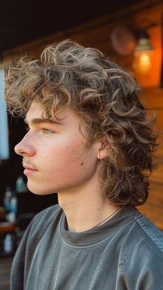 22 Mullet Hairstyles to Suit Every Curl Pattern Long Curly Mullet Men, Curly Shaggy Mullet, Shaggy Mullet Men, Long Permed Hair, Curly Mullet Men, Burst Fade Mullet, Corte Mullet, Fade Mullet, Shaggy Mullet