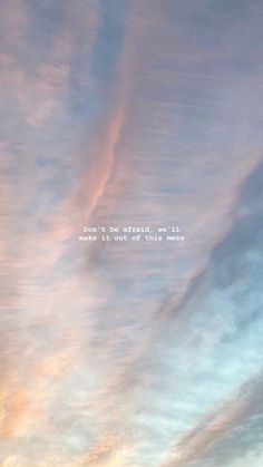 the sky is full of clouds with a quote written on one side and an airplane flying in the distance