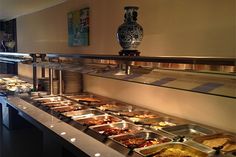 a buffet with many different types of food