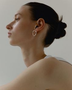 These Joe Earrings are lightweight and unique, could be a perfect match to wear everyday. Dimensions: length: 22 mm | 0.8 inches width: 18 mm | 0.7 inches Available in sterling silver or 14K gold plated silver. Matte or bright mirror finish, please choose your preferred one while ordering. Packed in a labeled gift box. Minimalist Teardrop Pierced Wrap Earrings, Modern Teardrop Wrap Earring, Modern Teardrop Single Wrap Earring, Minimalist Teardrop Single Plug Earring, Modern Teardrop Wrap Earring (single), Minimalist White Teardrop Earrings, Minimalist Single Drop Earring, White Drop Hoop Earrings For Pierced Ears, Organic Earrings