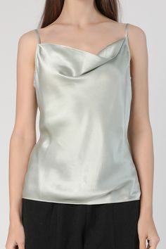 This graceful silk cowl neck camisole is made with premium mulberry silk. Adjustable shoulder strap allows you to tailor the neckline to your fitting. Style #: WWSH906 Elegant Sleeveless Blouse Camisole For Party, Formal Silk Camisole For Spring, Elegant Solid Sleeveless Camisole, Elegant Sleeveless Solid Camisole, Elegant Sleeveless Camisole For Party, Elegant Solid Color Sleeveless Camisole, Spring Silk Tops With Cowl Neck, Elegant Spring Camisole With Tank Straps, Formal Silk Tank Top For Summer