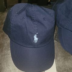 Classic Navy Rl Polo Cap Navy Casual Baseball Cap With Flat Bill, Navy Casual Flat Bill Baseball Cap, Casual Navy Hat With Flat Bill, Casual Navy Flat Bill Hat, Classic Blue Baseball Cap One Size, Navy Casual Baseball Cap With Short Brim, Navy Casual Visor Hat, Casual Blue Dad Hat With Flat Bill, Ralph Lauren Cap