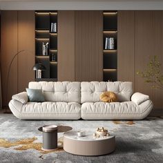 a modern living room with white furniture and bookshelves