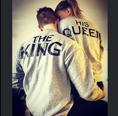 two people wearing sweatshirts that say his queen and the king are hugging each other