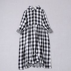 Product  DescriptionStylish black and white plaid dress featuring a small grid pattern inside. Crafted from pure cotton double-layer yarn for a soft, skin-friendly, and breathable feel. Offers a baby-like touch and comfortable wear. Features a small square collar, wooden button half-open skirt design, exuding a rich literary temperamentSize InformationOne free size (cm)Length 105 Shoulder Width 39 Bust 110 Waist 112 Hem 190Sleeve Length 51 Sleeve Circumference 42 Cuff Circumference 22fabric compositionFabric: Double-layer cotton yarn Plus Size Autumn Dresses, Fall Patchwork, Black And White Plaid Dress, White Plaid Dress, Lace Top Dress, Black And White Plaid, Pleated Maxi Dress, Short Sleeve Mini Dress, Grid Pattern