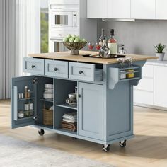 a kitchen island with two drawers and a cutting board on it