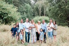 a group of people standing together in a field