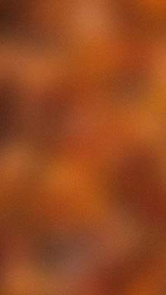 blurry image of an orange and brown background