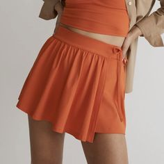 Madewell Tangerine Flex Wrap Side Tie Skort Brand New - Without Hang Tag/Paper Tag. The Brand Name Inside Is Covered To Prevent Returns To The Retail Stores. Material - 79% Recycled Polyester, 21% Elastane The Fabric: Engineered With Four-Way Stretch, Mwl Flex Is Supersoft, Sweat-Wicking And Made Using Recycled Materials. The Fit: A Best-Of-Both-Worlds Wrap Skort With Adjustable Side Ties And Built-In Shorts Underneath. The Set: Try It With The Matching Tank Or Dress It Up A Bit Paired With An O Orange Stretch Skort For Summer, Summer Stretch Orange Skort, Casual Orange Stretch Skort, Casual Fitted Orange Skort, Chic Orange Summer Skort, Orange Short Length Skort, Casual Orange Skort For Summer, Wrap Skort, Retail Stores