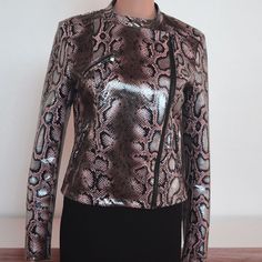 Condition: New With Tags. Edgy Snakeskin Patterns This Faux-Leather Moto Jacket Designed With An Asymmetric Zip Closure. Details & Care: * Brand: Dolche Cabo * Approx. Length 20” / Size: S * Color: Pink, Grey And Black / Snake Print * Long Sleeves * Mock Neck With Snap Closure * Diagonal Zip Up * Belted With Zipper Accents And Tab Pocket In Front * Material: Faux Leather * Lining: 100% Polyester * Dry Clean Only Size Approximate * Bust: 32” - 34” * Waist: 24” - 26” Mannequin In The Photos: Bust Pink Winter Biker Jacket For Party, Pink Winter Party Biker Jacket, Spring Party Leather Jacket With Zipper Closure, Chic Pink Long Sleeve Biker Jacket, Chic Pink Leather Jacket With Zipper Closure, Chic Fitted Pink Biker Jacket, Chic Pink Biker Jacket, Chic Pink Fitted Biker Jacket, Faux Leather Moto Jacket