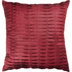 a red pillow on a white background