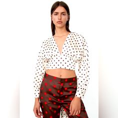 V-Neck Crop Top Featuring Long Cuffed Sleeves, A Back Vent And Tie Detail At The Hem. Chic V-neck Polka Dot Blouse, Chic Polka Dot Blouse By Zara, Zara Chic Polka Dot Blouse, Chic Zara Polka Dot Blouse, Polka Dot V-neck Blouse For Day Out, Neck Crop Top, Zara Tops, Cuff Sleeves, Polka Dot Top