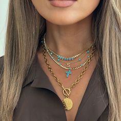 Personalize your style with this 14K turquoise bead necklace, featuring a custom initial charm. From our Eternal Skies collection, it’s the perfect thoughtful gift, blending vibrant color with a personal touch. Ideal for layering or wearing solo, this piece is a standout for any occasion. Material: 14K Solid GoldStones: Turquoise Resin and CZLength: Adjustable up to 12.5"- 16.5"Approximate Gold Weight: 3.6 grams Turquoise Cross Necklace, Turquoise Resin, Turquoise Necklaces, Timeless Symbol, Vibrant Style, Sky Collection, Turquoise Cross, Turquoise Bead Necklaces, Custom Initials