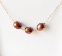 Necklace Maddi - Chocolate pearls necklace (N168) Elegant Brown Necklace With Pearl Pendant, Brown Pearl Pendant Necklace Gift, Brown Pearl Pendant Necklace As Gift, Brown Pearl Pendant Necklace For Gift, Gift Brown Pearl Pendant Necklace, Brown Pearl Necklace Gift, Elegant Brown Wire Wrapped Necklace, Chocolate Pearls, Famous Chocolate