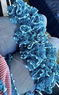 A blue crocheted scarf made by hand. I have so much fun with these. It is warm and cozy! A great gift as we enter the cooler months. Crocheted Scarf, Crochet Scarves, Gift Baskets, Festival Season, Warm And Cozy, Scarf Wrap, Scarf Accessory, Beauty Book, Great Gifts