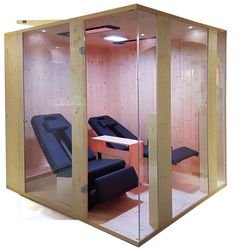 an indoor sauna with two chairs and a table