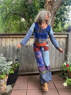 These are an original Zasra design, a one of a kind, handmade, eco friendly, patchwork, repurposed jersey knit pair of wide leg, gaucho pants.   For this particular pair, I selected shades that remind me of Patagonia colors, such as, royal purple, olive, denim blue, soft turquoise, rust,tangerine, off white, navy. I have also made these in a mix of prints, stripes, tie dye, folk floral and solids. The foldable yoga style waistband is made from stretch jersey knit, in a solid navy and also has a Hippie Wide-leg Patchwork Pants, Hippie Wide Leg Patchwork Pants, Blue Bohemian Harem Pants For Festivals, Bohemian Blue Harem Pants For Festival, Blue Bohemian Full Length Pants, Bohemian Style Full Length Blue Pants, Blue Bohemian Pants For Festival, Bohemian Blue Pants For Festival, Blue Hippie Harem Pants For Festival